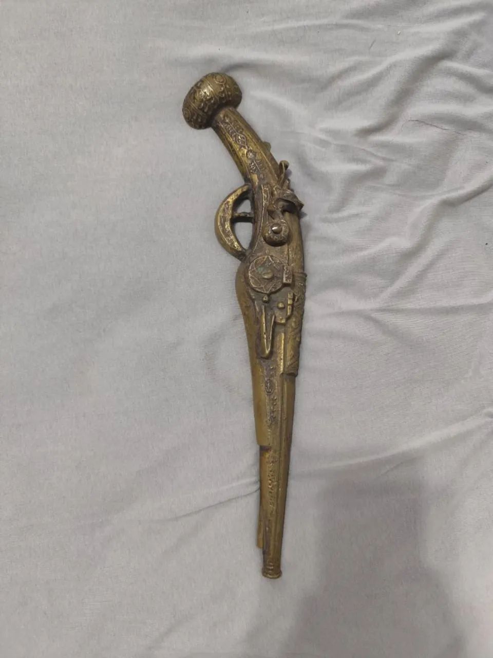 Objetivo decorativo de bronze