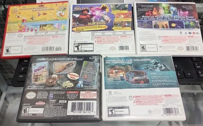 Lote 5 x Jogos New Super Mario Bros 2, LEGO Batman 3, Street Fighter 4, Cars, Tom Clancy's - Foto 2