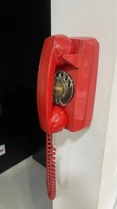 Telefone de parede vintage vermelho