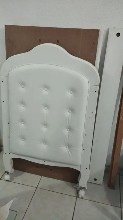 Berço com capitonê