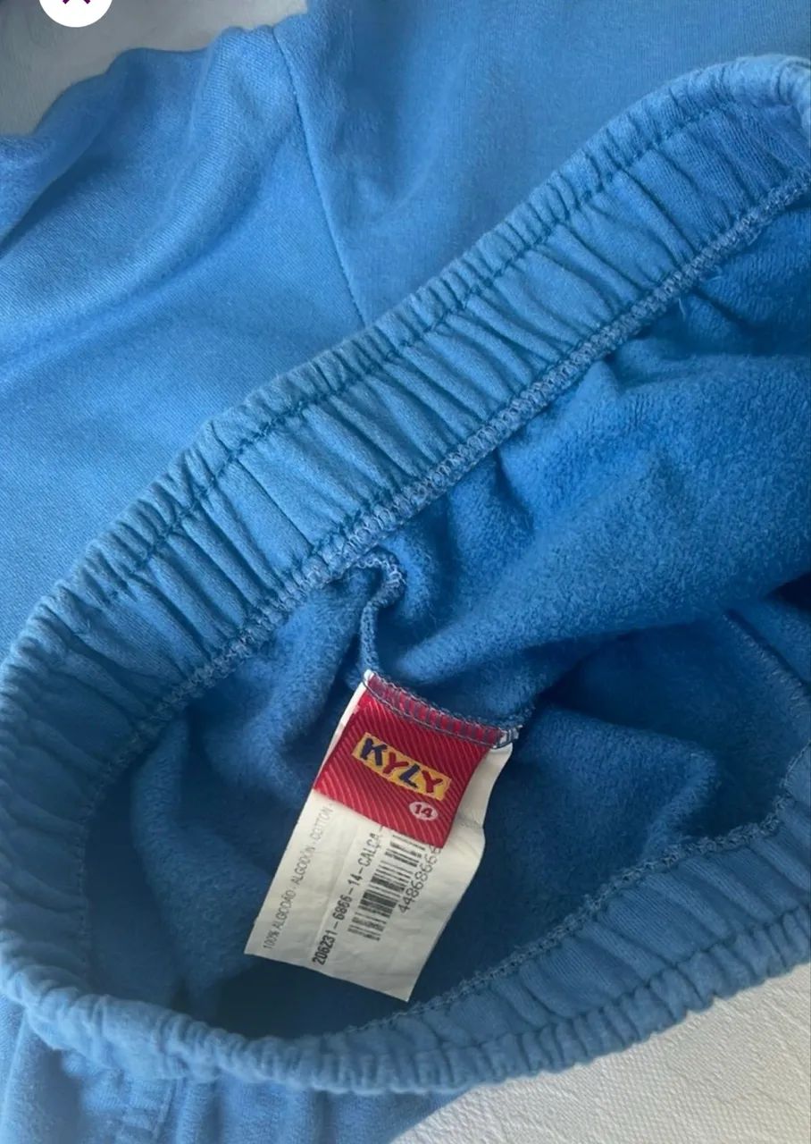 Calça de moletom infantil azul claro com bolso lateral Kyly  - Foto 3