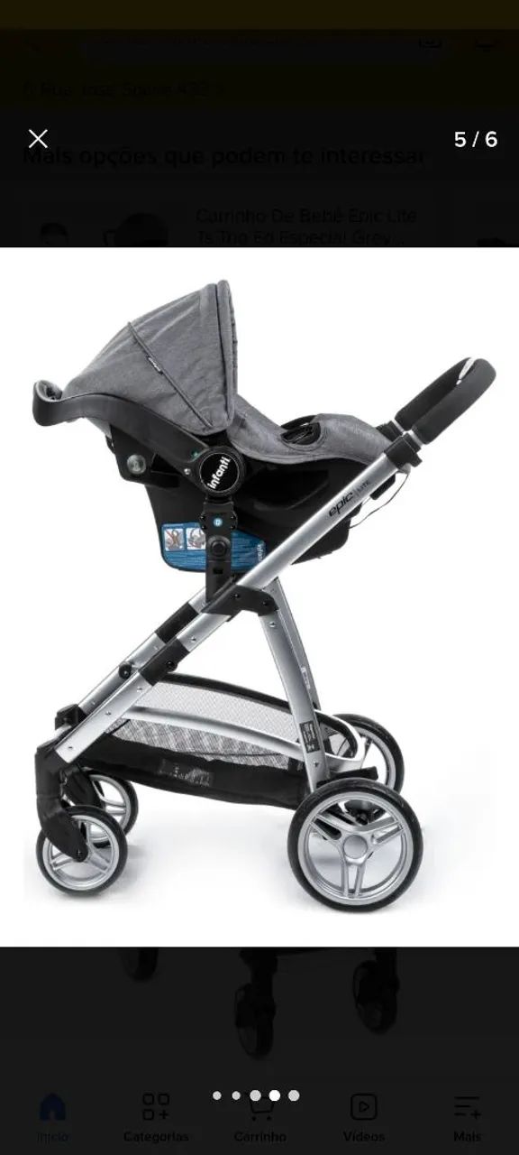 Carrinho de bebê infantil com bebê conforto