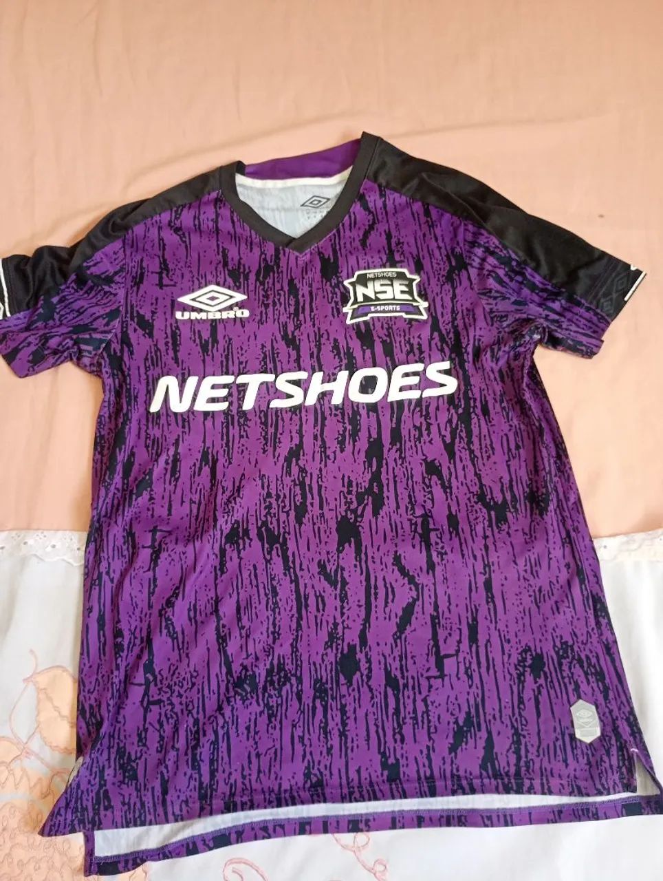 Camisa umbro Netshoes  usada 