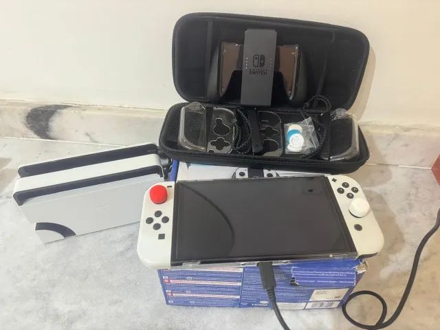 Nintendo switch Oled novíssimo  - Foto 3