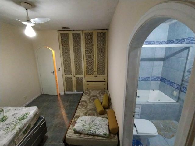 Melhor casa para desfrutar bons momentos há 150 metros da praia da Guaiúba Guarujá - Foto 3