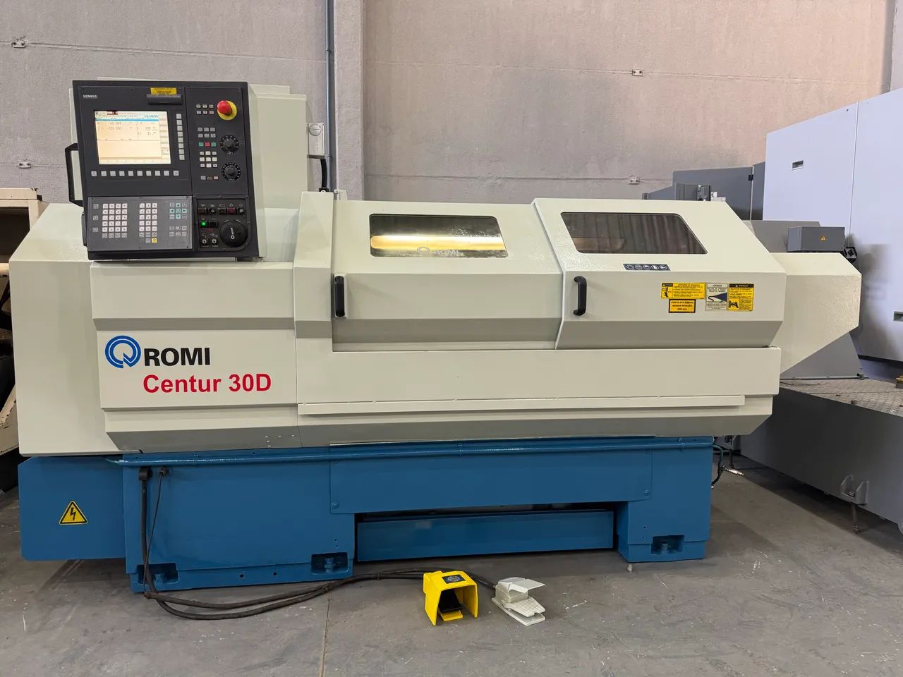 Torno cnc Romi 