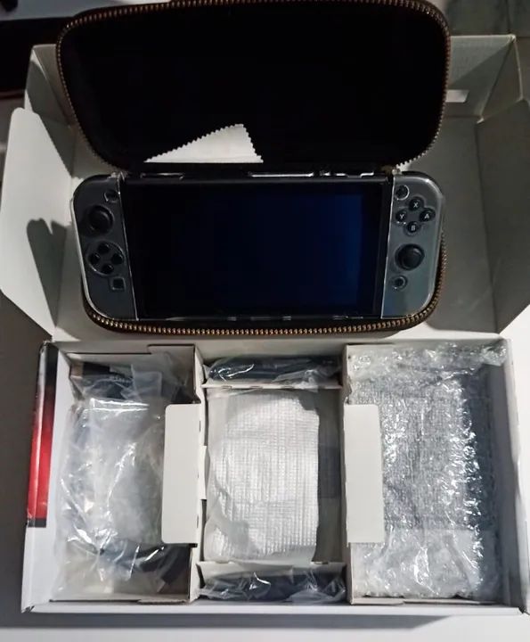 Nintendo Switch Completo 32gb e Zelda Botw + 670 em acessorios (POUCO USADO) - Foto 2