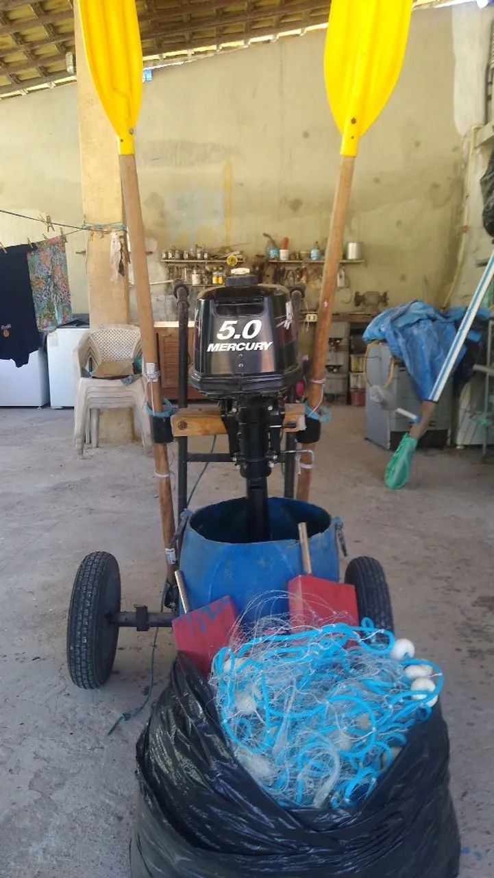 Motor de poupa de cinco Hp 
