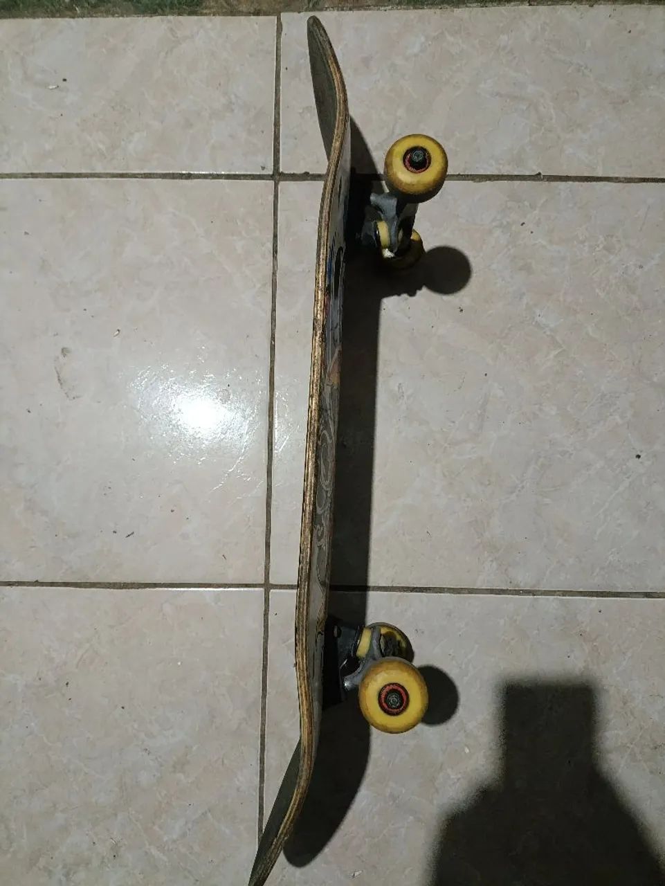 Skate um pouco usado que está muito tempo parado
