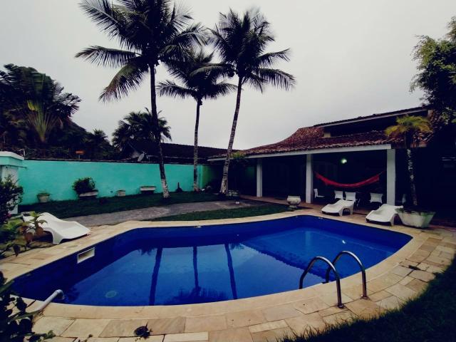 Melhor casa para desfrutar bons momentos há 150 metros da praia da Guaiúba Guarujá - Foto 6