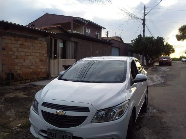 Vende -se ônix LT 2016/2016 30km estepe nunca rodado - Foto 2