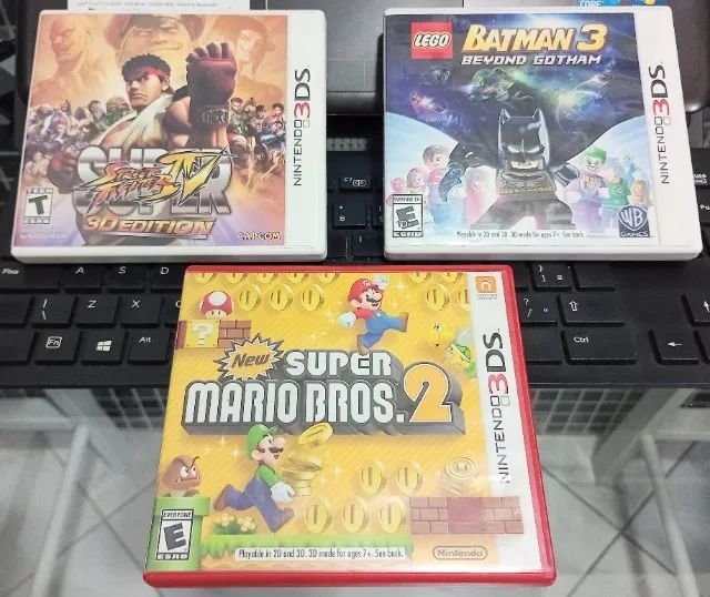 Lote 5 x Jogos New Super Mario Bros 2, LEGO Batman 3, Street Fighter 4, Cars, Tom Clancy's - Foto 3