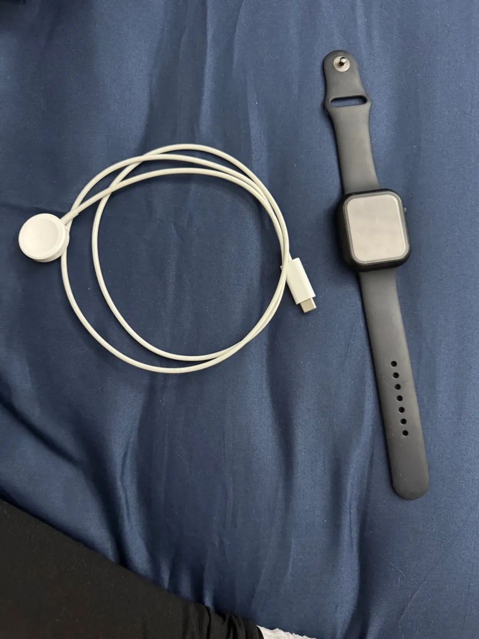 Apple Watch com carregador