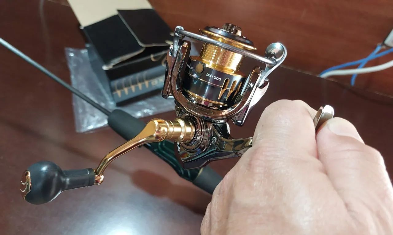 Vara de pesca com molinete  - Foto 3