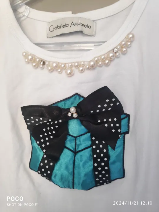 Um LUXO: Conj.Blusa, short + bolsinha 55,00 aceito c.credito Tx 5,00