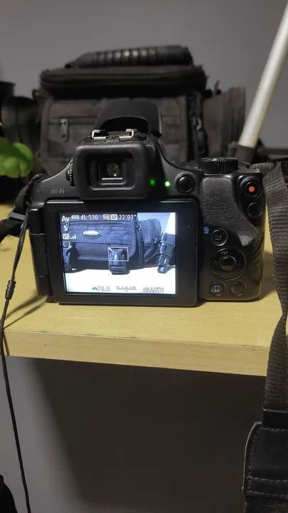 Câmera Canon SX60 + bolsa de transporte + tripé 