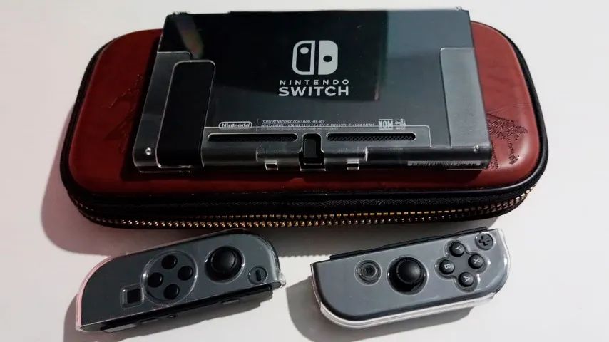 Nintendo Switch Completo 32gb e Zelda Botw + 670 em acessorios (POUCO USADO) - Foto 5