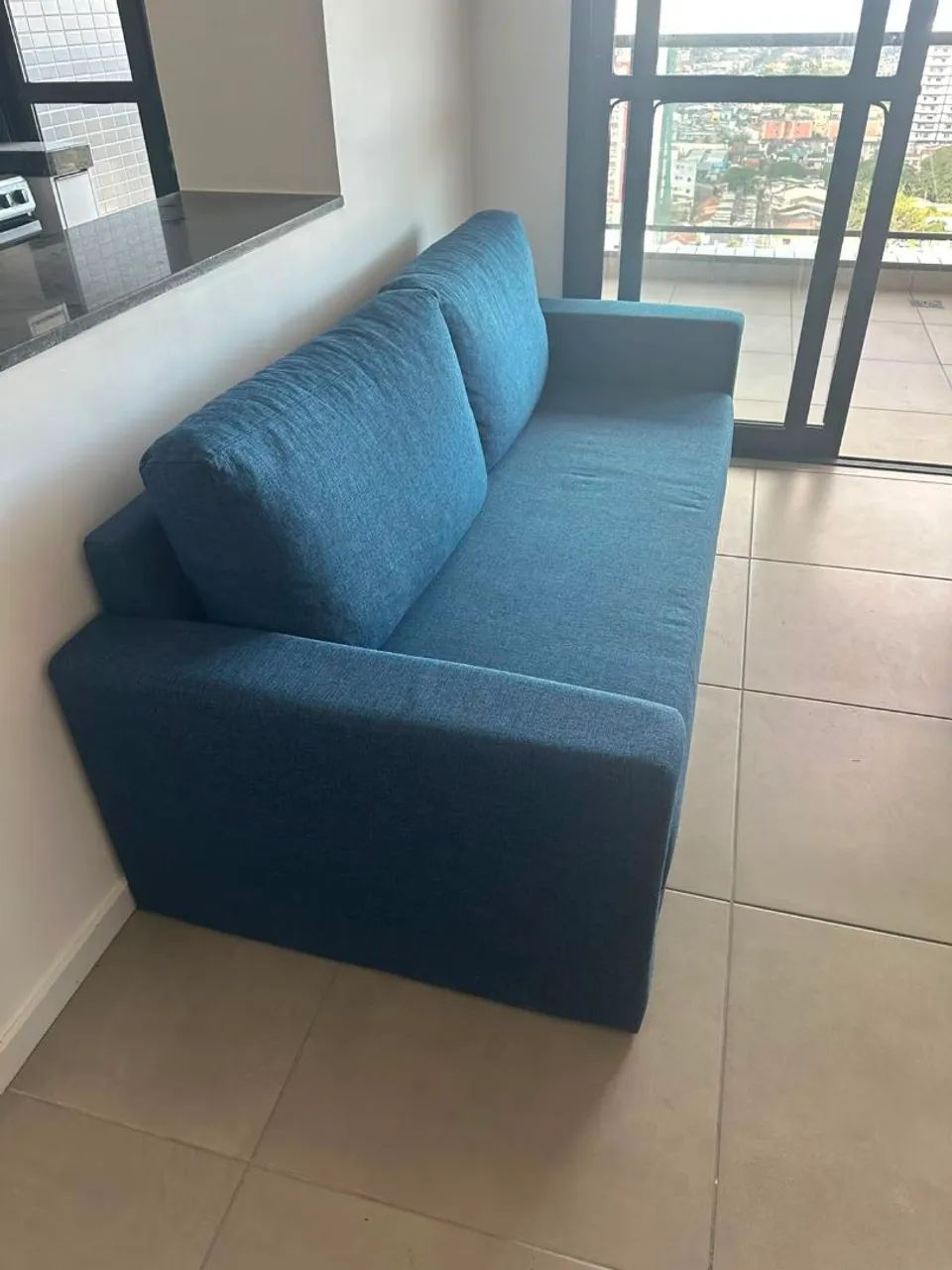 Vendo sofá azul, pouquíssimo uso, 3 lugares 2mX95cm