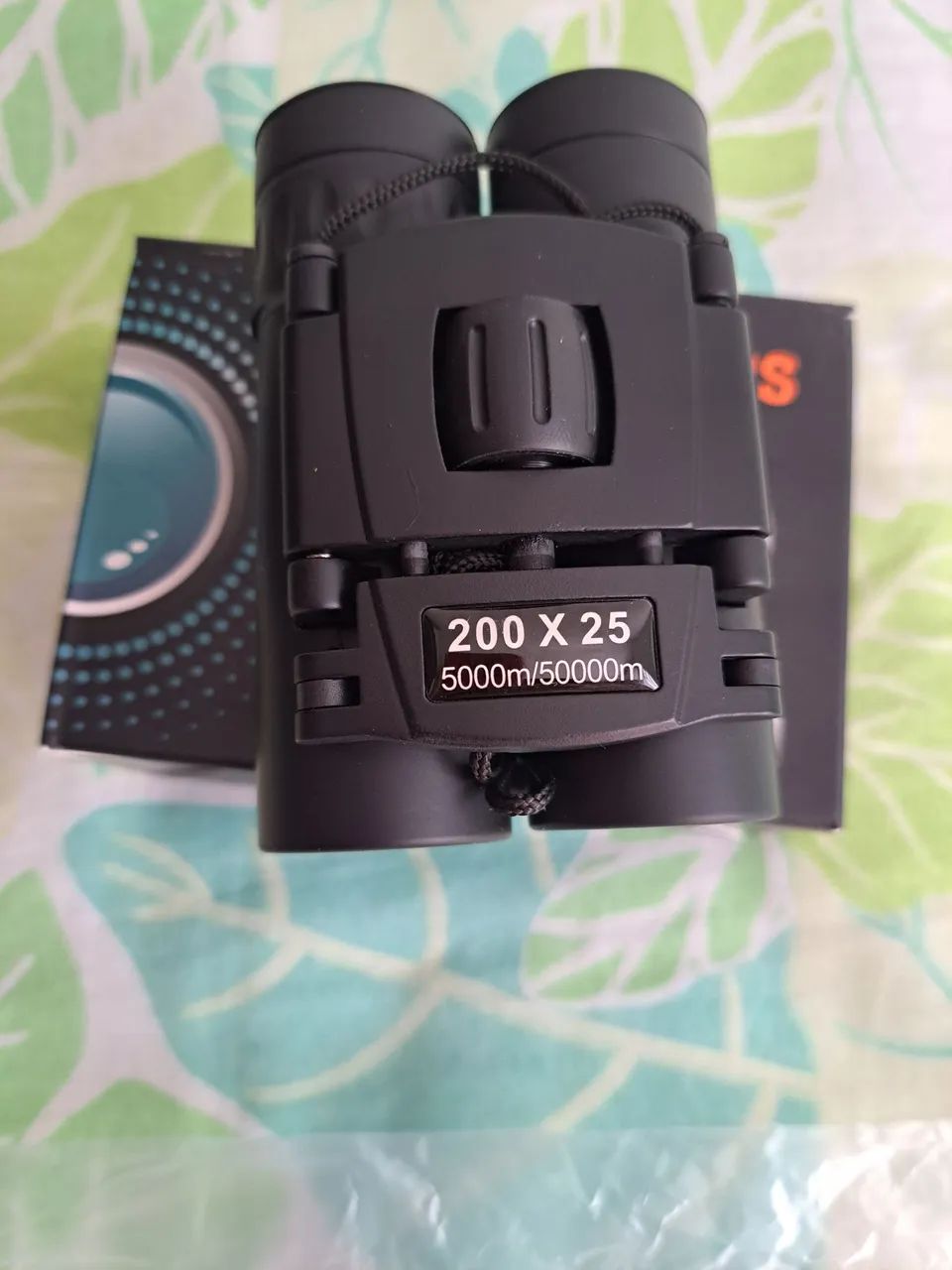 Binóculo 200x25 5000m/50000m novo 430 reais tratar com tonhao *. - Foto 2
