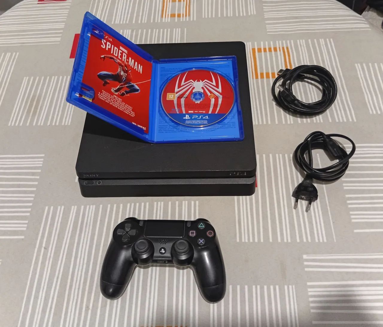 Play Station 4 + Marvel Spider Man