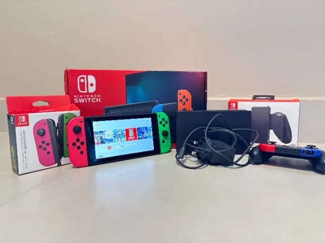 Nintendo Switch V2 + 4 Joy-cons + 2 Comfort Grips + microSD 128GB + Dock e Caixa