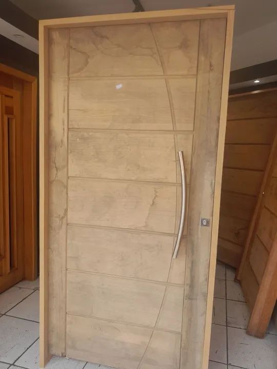 Porta pivotante 108x214mt madeira tauari 10X sem juros no cartão 