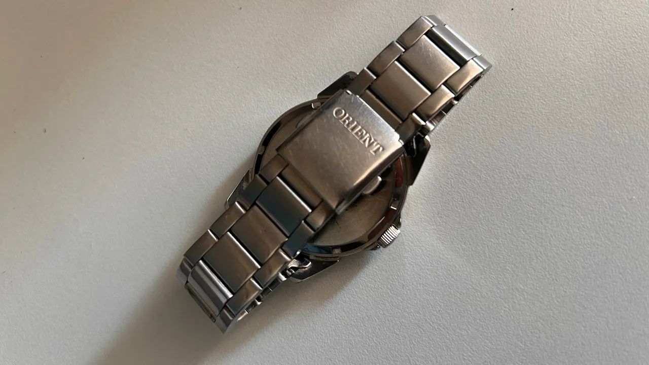 Relógio Orient quarts, pulseira metal  - Foto 3
