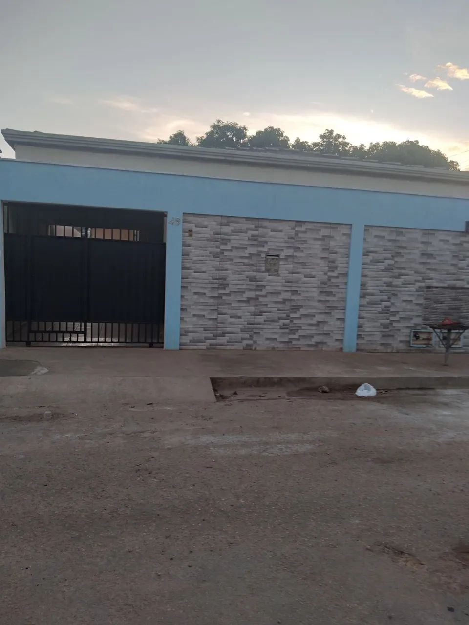 Aluga se casa com garagem