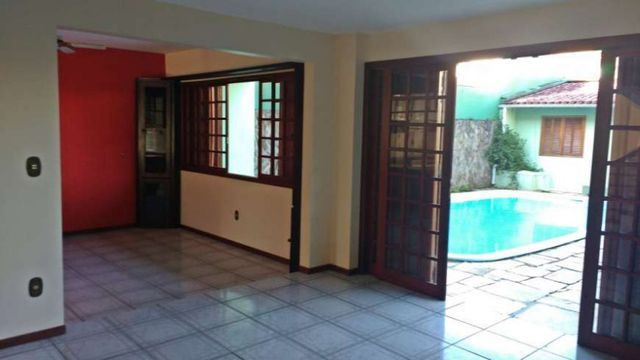 Casa à venda com 4 dormitórios e 4 suítes no bairro Parque São Jorge em Florianópolis - Foto 6