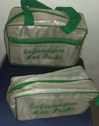 Duas bolsas com o efemagem e Ana paula
