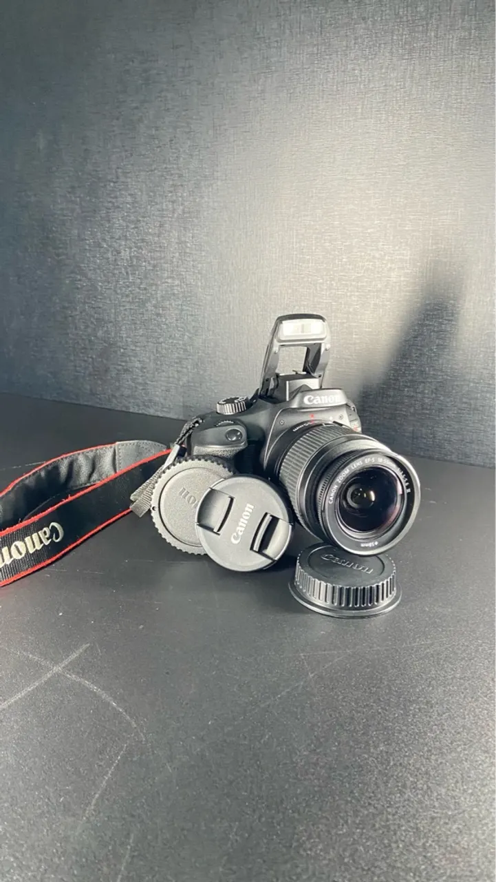 Canon EOS Rebel T100 + lente 18-55mm III DSLR cor preto + Bolsa