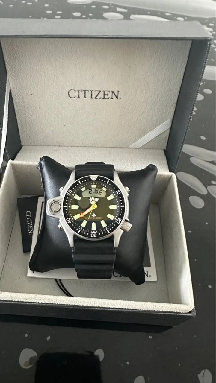 Relógio Citizen série prata jp2000