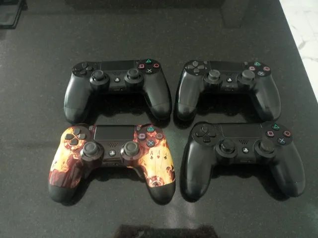 PS 4 usado com 8jogos de CD e 4 controles  - Foto 4