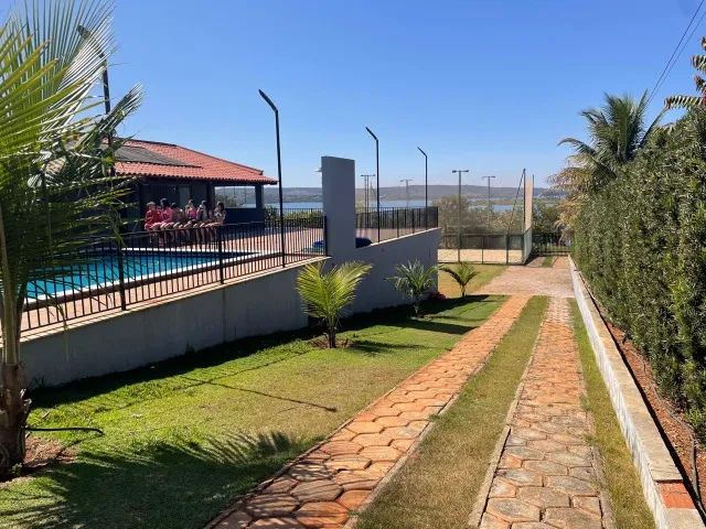 Excelente casa em condomínio no Corumbá 4, lote 2.400 metros, vista espetacular, na beira