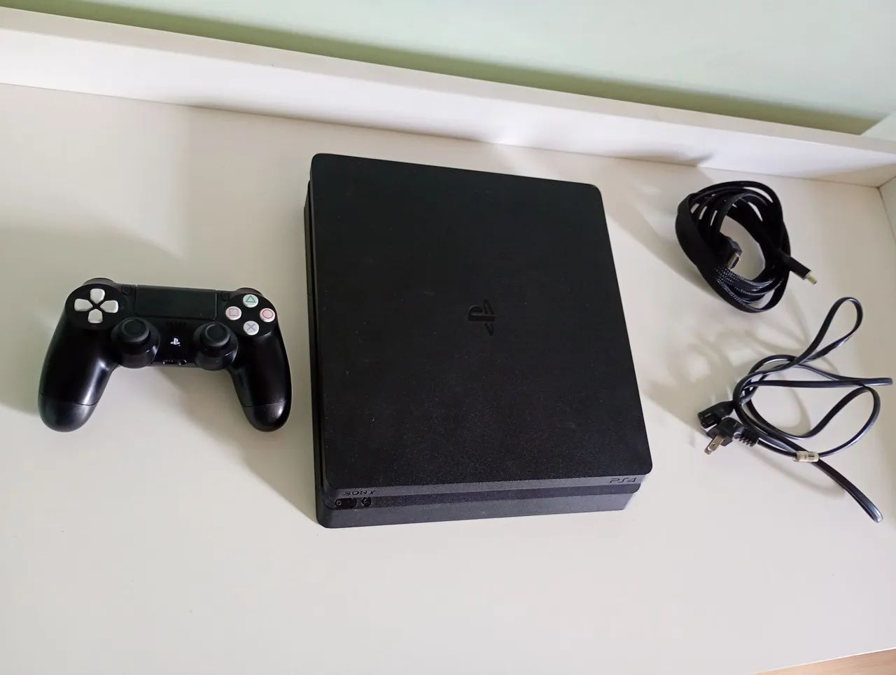 Ps4 slim 1 terá funcionando perfeitamente 