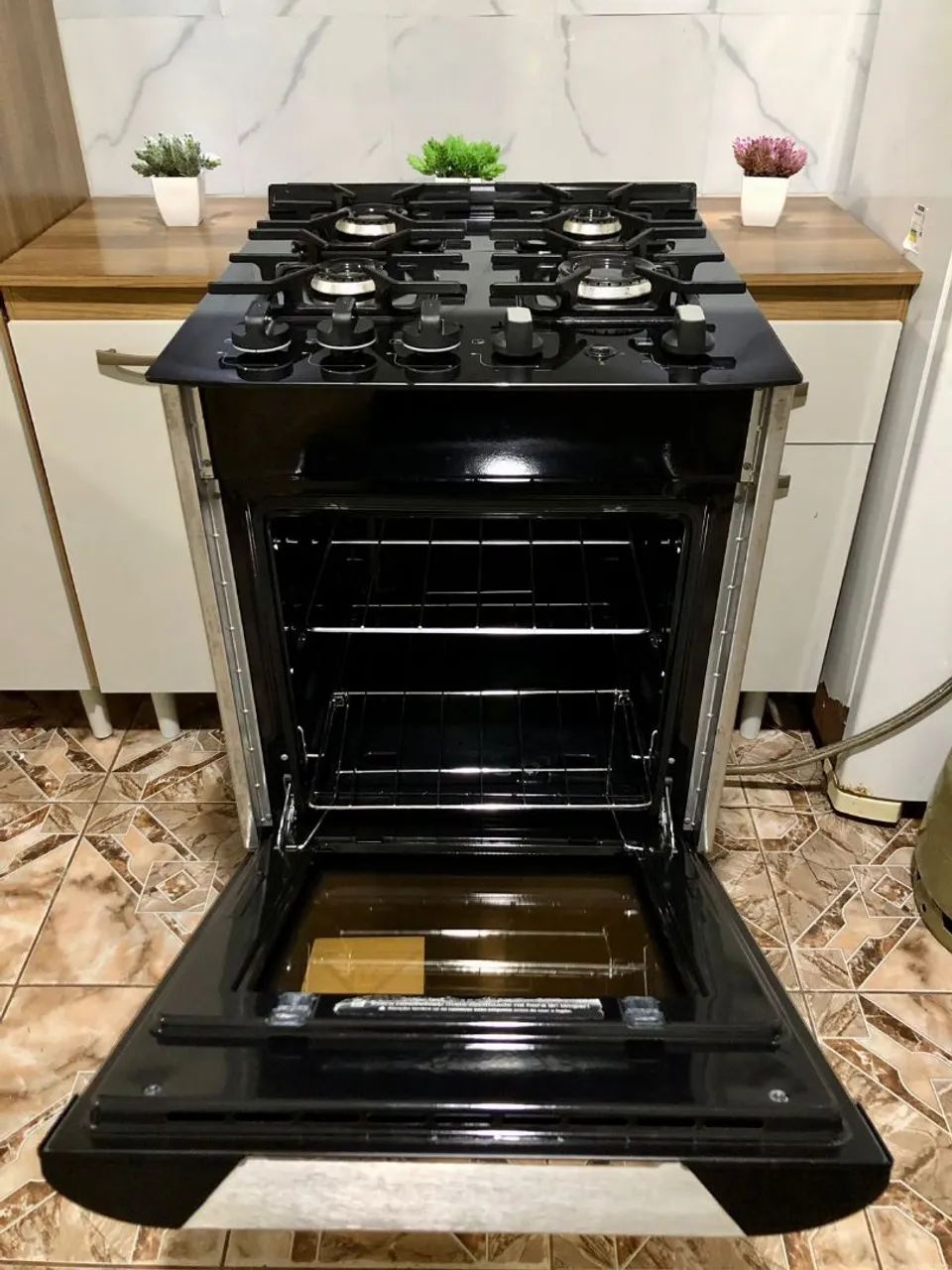 VENDO FOGÃO MODELO MUELLER MESA DE VIDRO ESPELHADO 04 BOCAS  - Foto 5