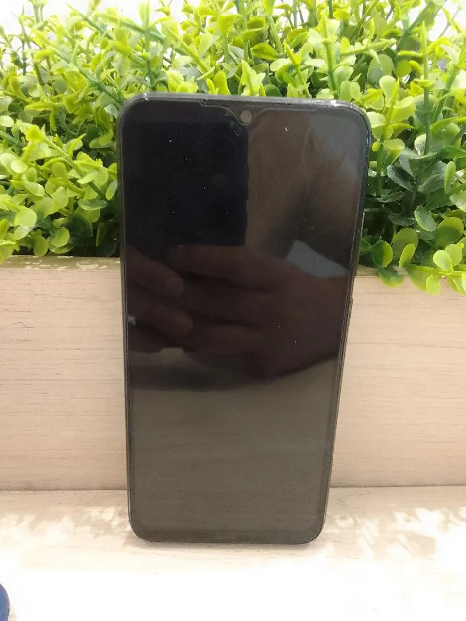 Celular bem conservado com pouco tempo de uso