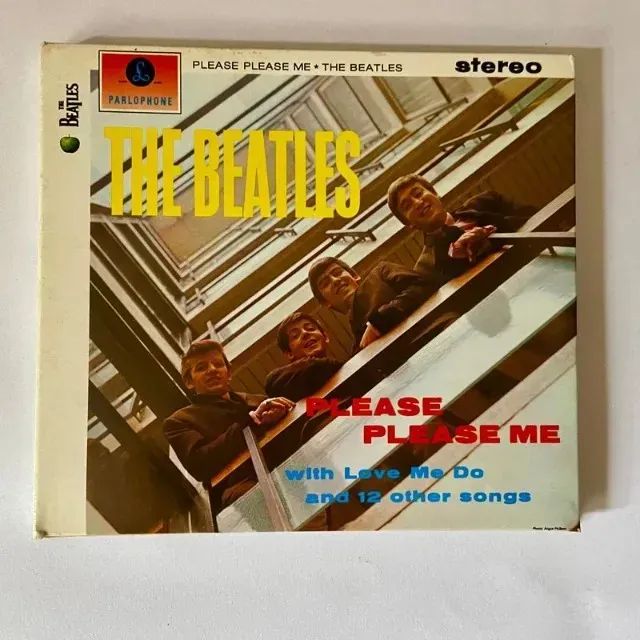 Cd dos Beatles e Coldplay