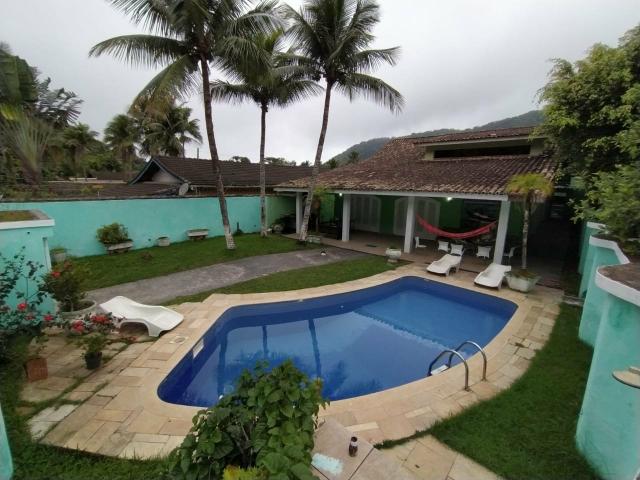 Melhor casa para desfrutar bons momentos há 150 metros da praia da Guaiúba Guarujá - Foto 5