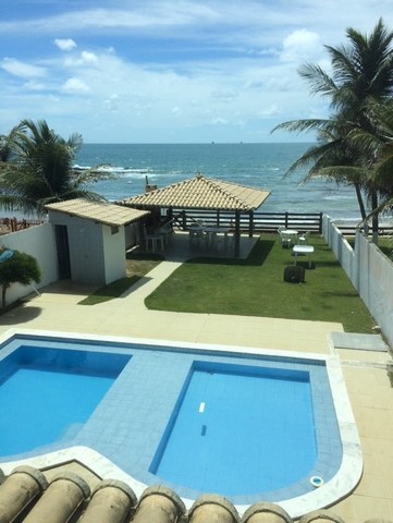 Aluguel por temporada de casa com 08 suítes à beira mar de Enseada dos Corais