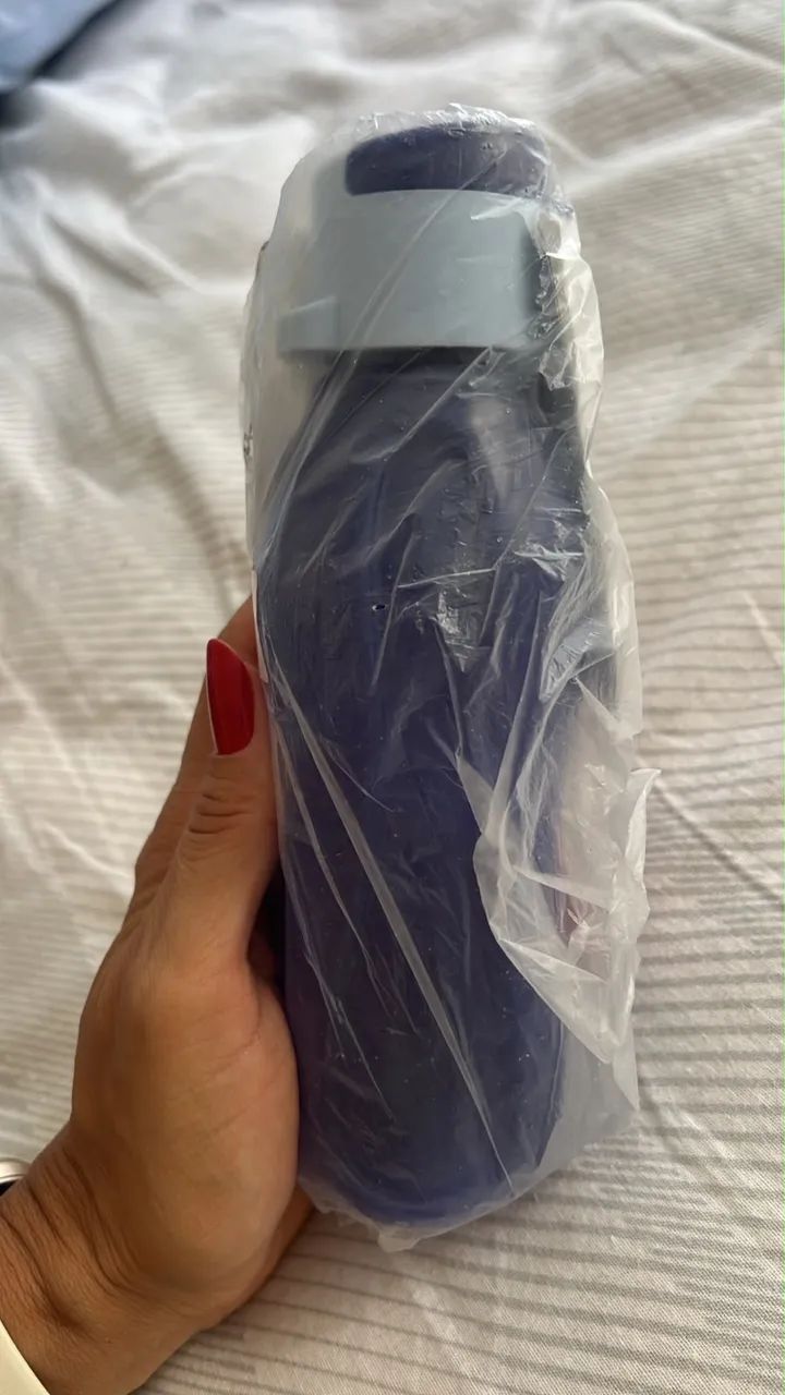 Garrafa Tuppeware 310ml lacrada.
