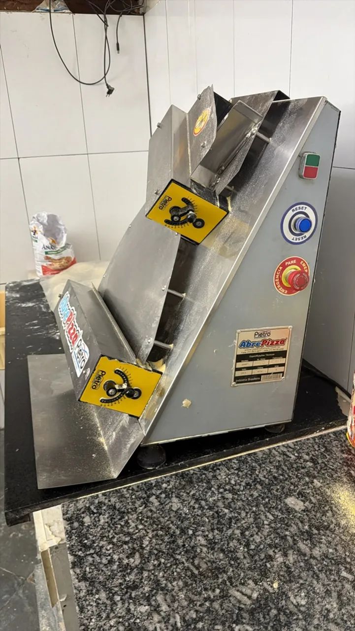 Máquina de abre pizza