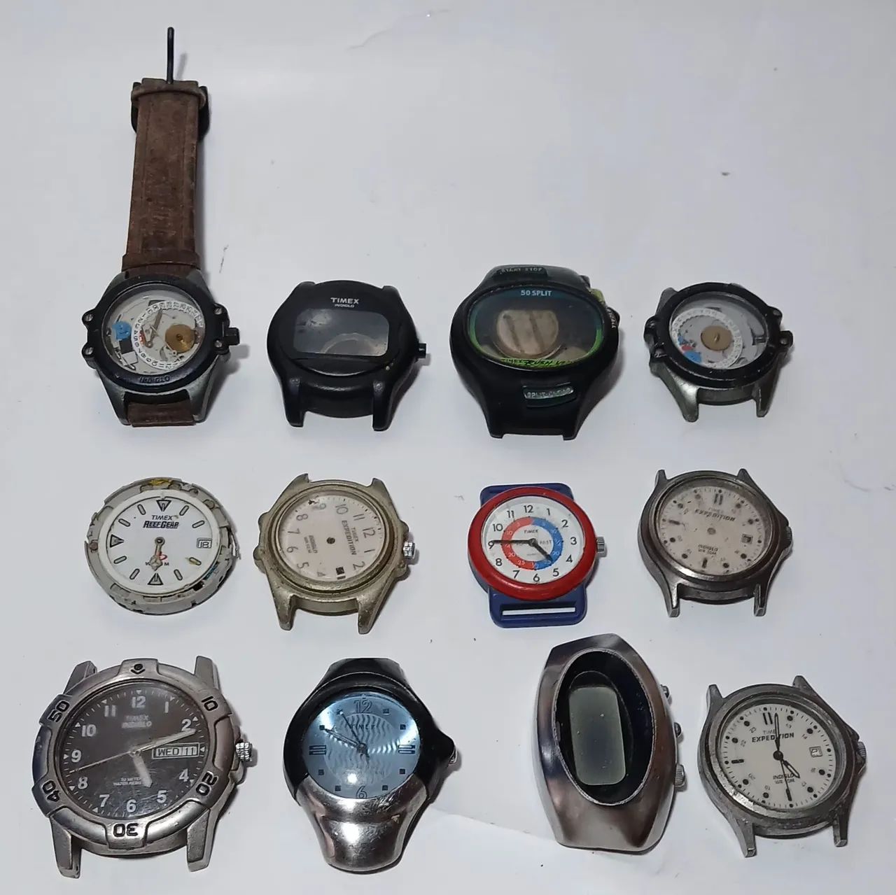 lote 12 partes de relógios timex - para retirada de peças