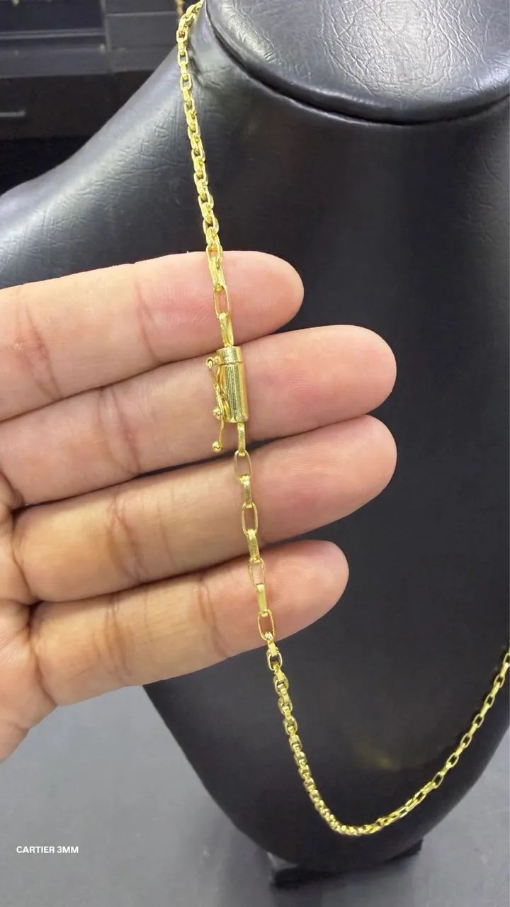 Corrente moeda antiga nova