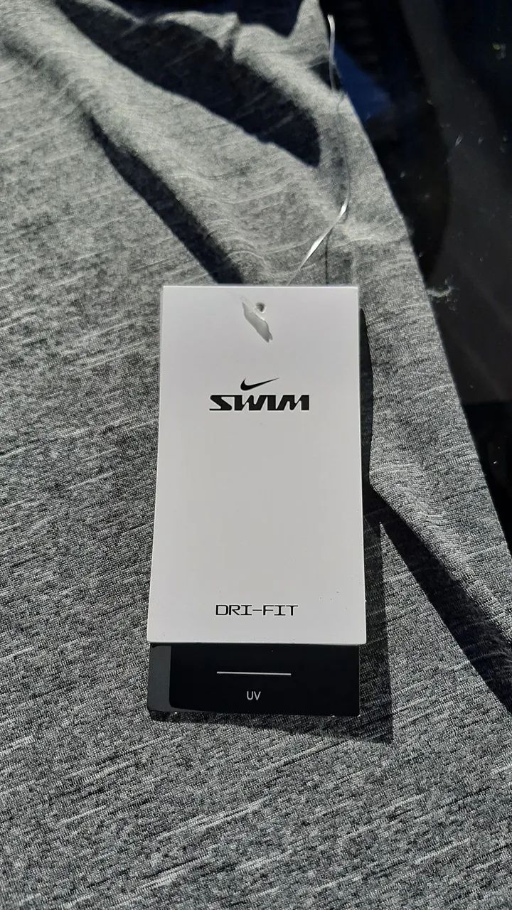 Camiseta Nike Dri-FIT Swim Masculina - Foto 4