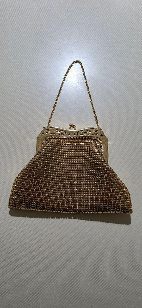 Bolsa de festa dourada