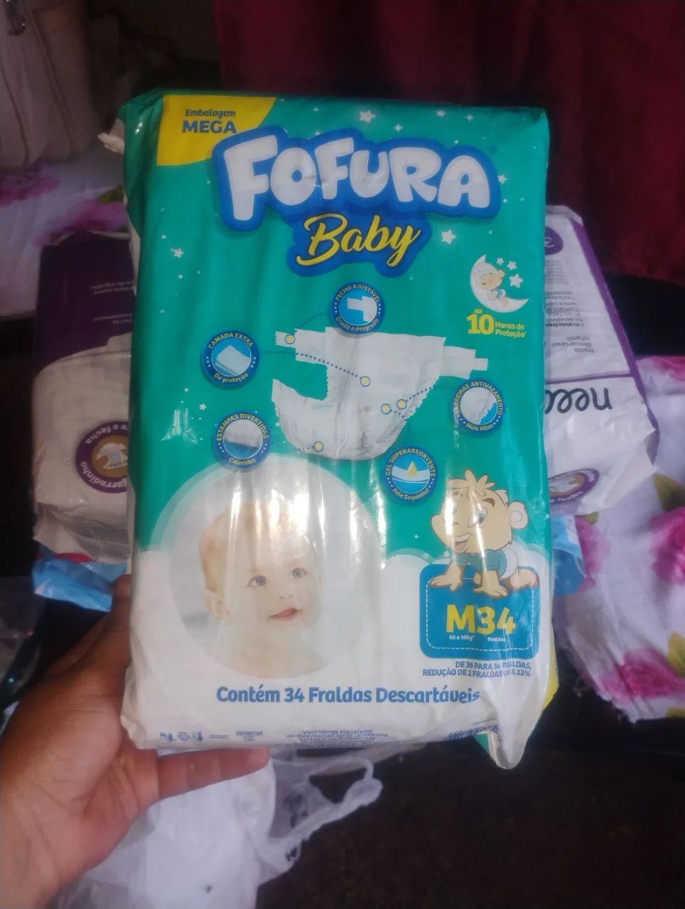 3 pacotes de fralda 