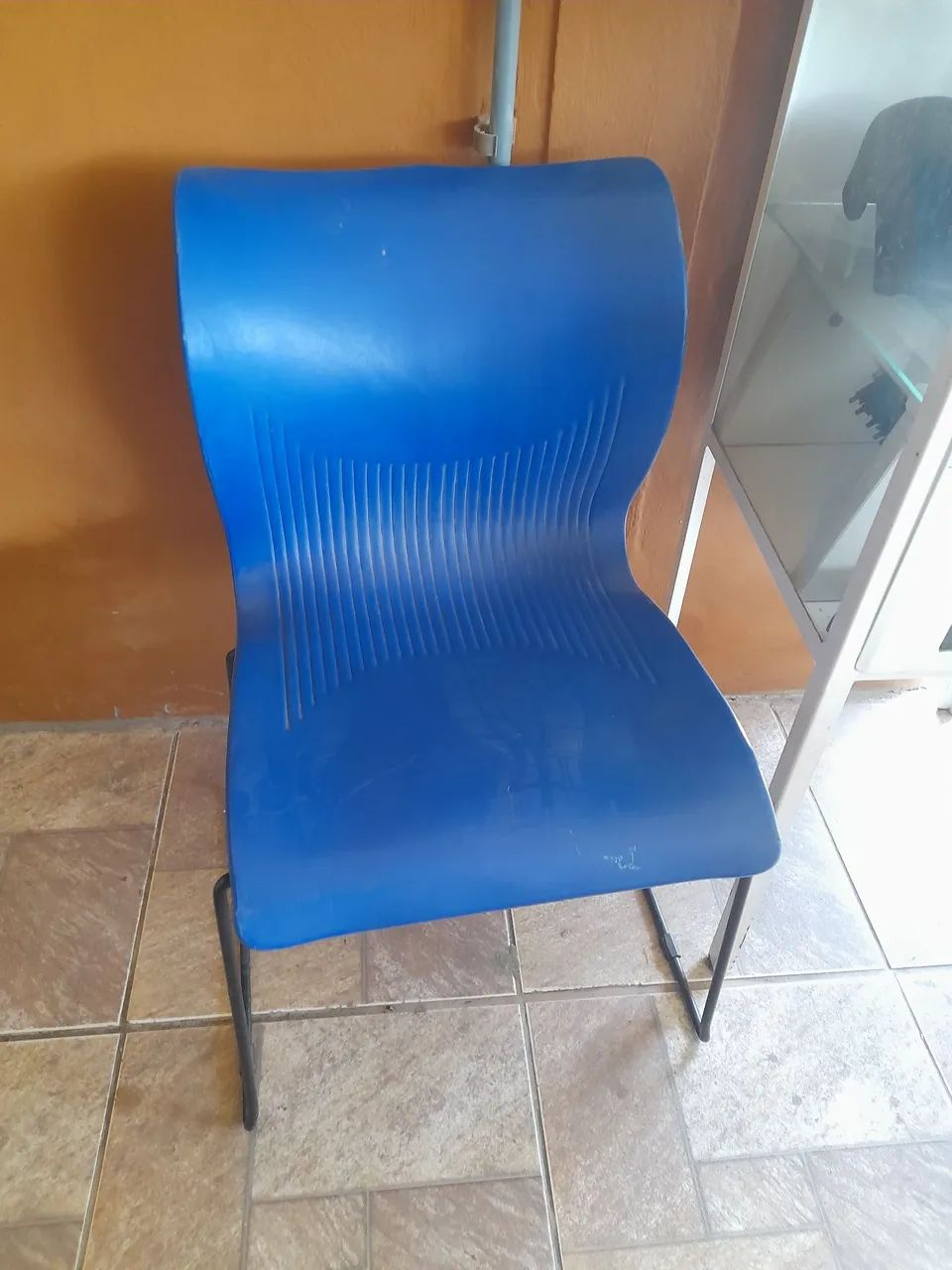 Cadeira fixa azul Usada