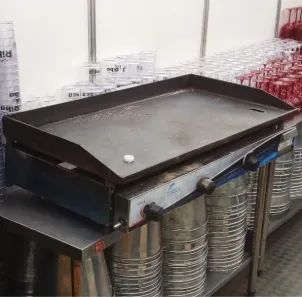 Chapa de lanchonete usada