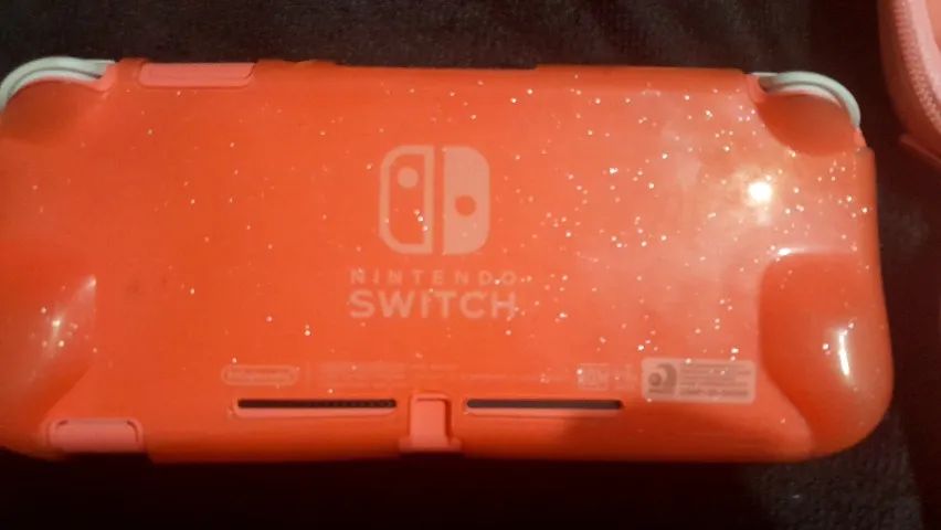Nintendo switch coral lite na caixa com jogos, acessorios, e amiibo animal crossing - Foto 3